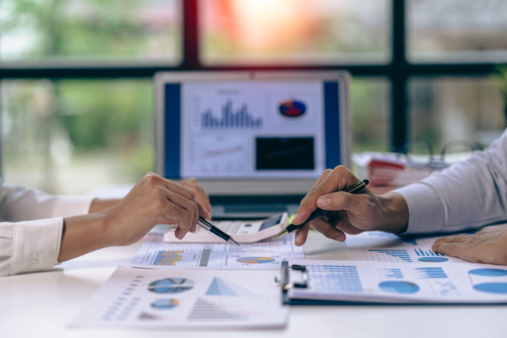 Business consultants meeting to discuss technology strategy
