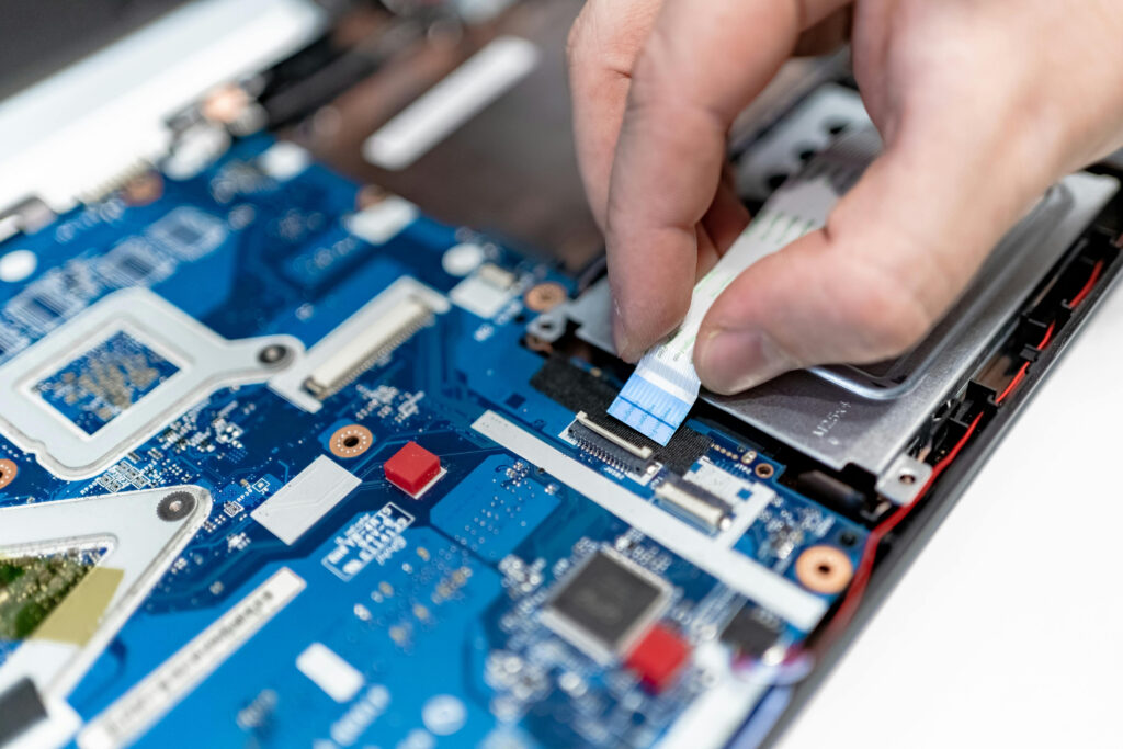 Technician Working On Computer Internal Component